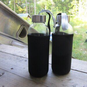 TWO 16 Ounce Glass Water Bottles Stainless Lid Carrying Straps Black Sleeve